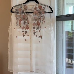 Elie Tahari silk blouse with muted embroidery at the shoulders and neckline.